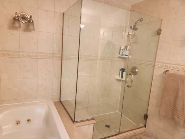 bathroom featuring plus walk in shower