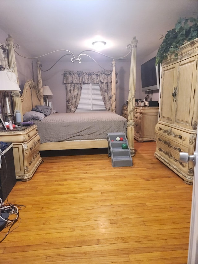 bedroom featuring light hardwood / wood-style floors