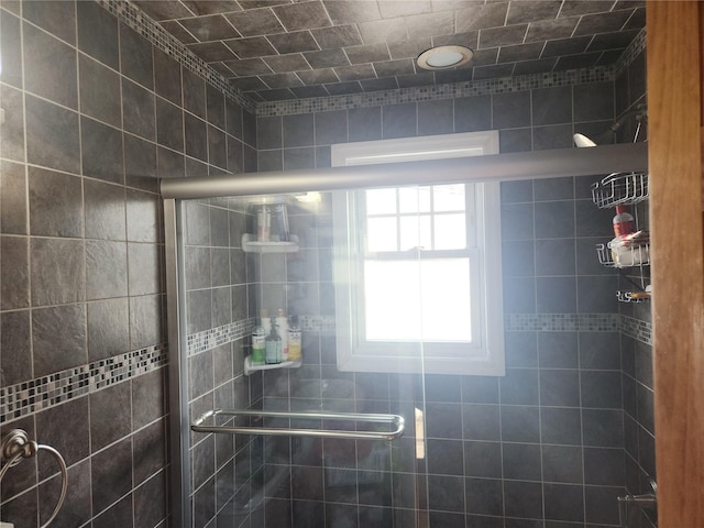 bathroom with an enclosed shower