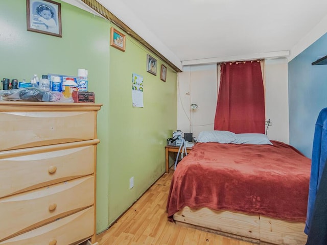 bedroom featuring light hardwood / wood-style flooring