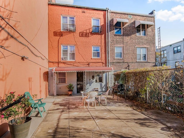 rear view of house with a patio area