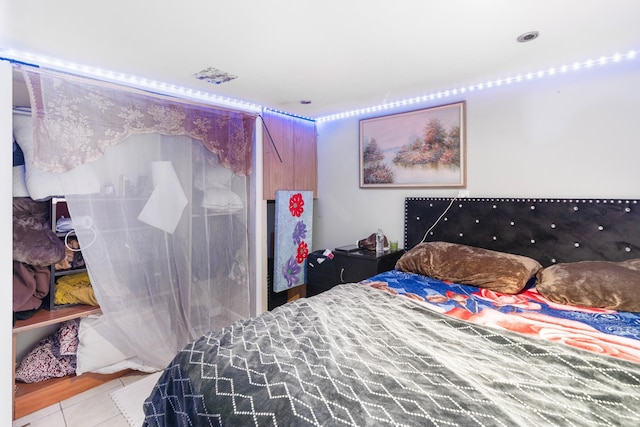 bedroom with tile patterned flooring