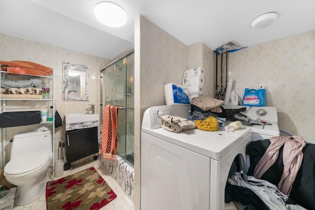 full bathroom with tile patterned flooring, vanity, toilet, and enclosed tub / shower combo