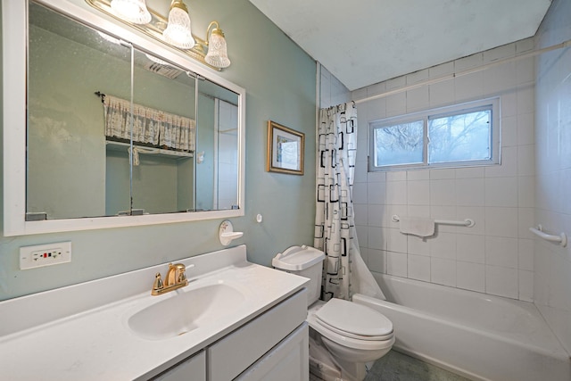 full bathroom featuring vanity, shower / tub combo, and toilet