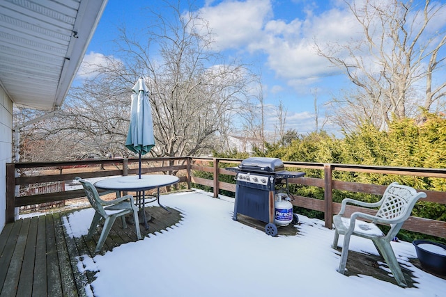 wooden deck with grilling area