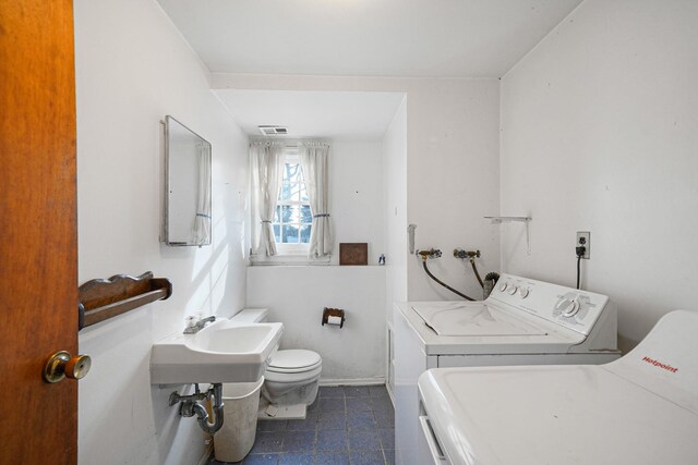 laundry area featuring separate washer and dryer