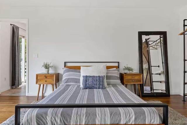 bedroom featuring wood-type flooring