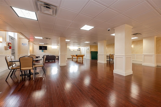 dining room with dark hardwood / wood-style floors