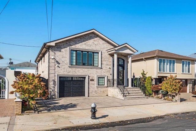 view of front of home with a garage