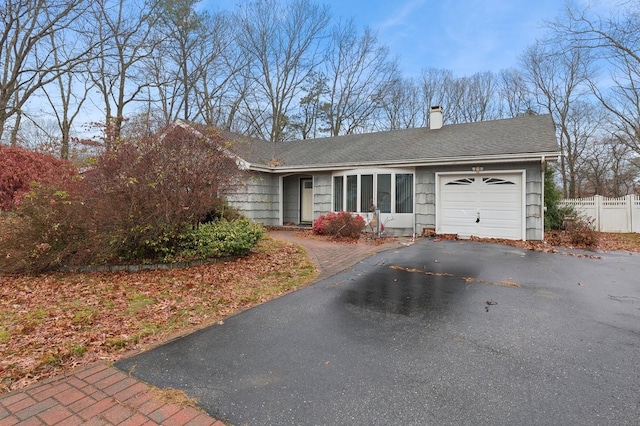 single story home with a garage