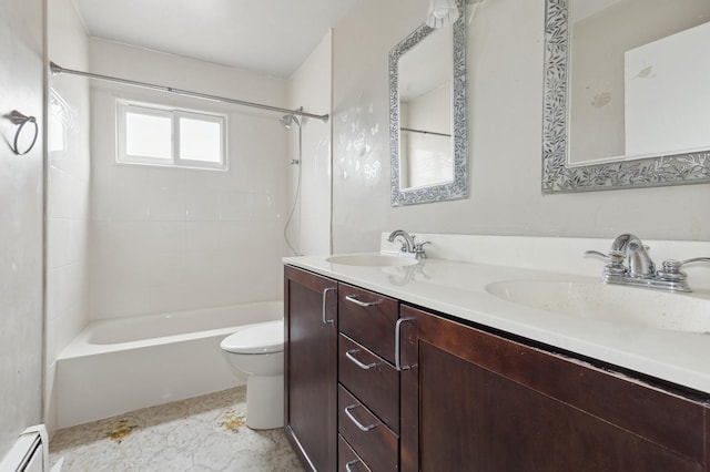 full bathroom with vanity, a baseboard radiator, toilet, and tiled shower / bath