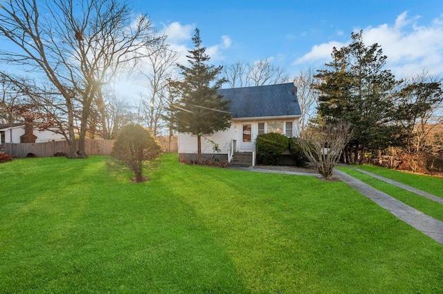 view of front of home with a front yard