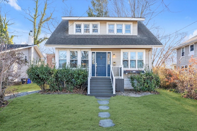 view of front of home featuring a front lawn