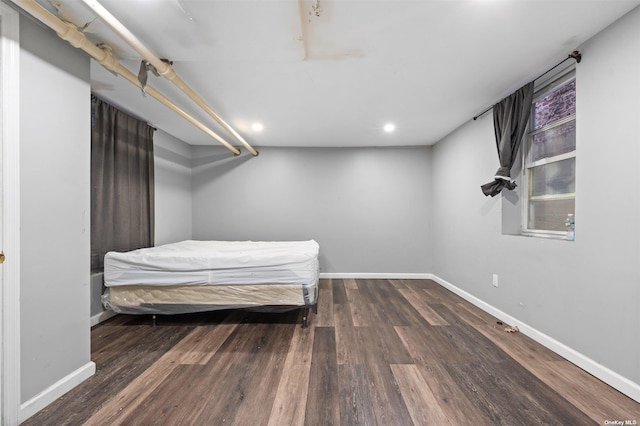 bedroom featuring dark hardwood / wood-style floors