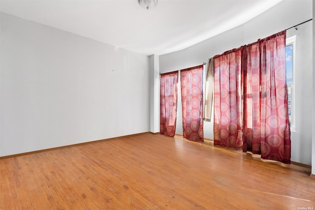 empty room with light wood-type flooring