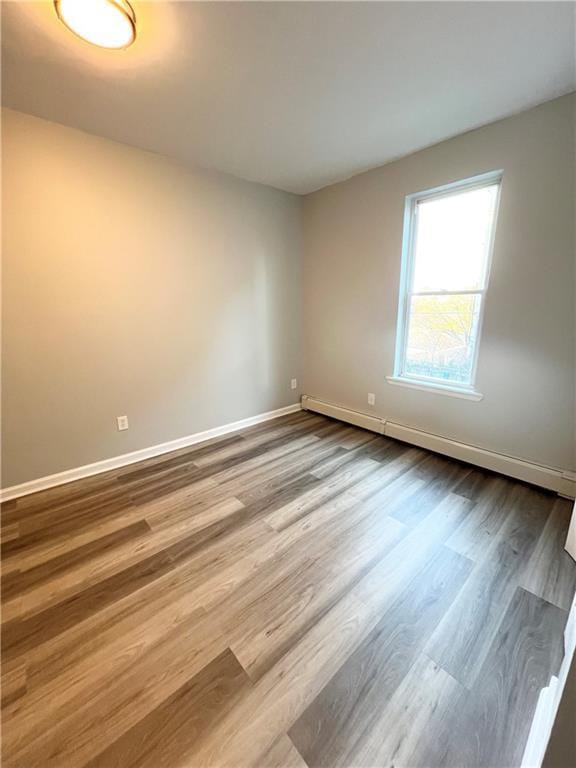 empty room featuring light hardwood / wood-style floors