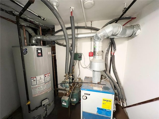 utility room featuring gas water heater