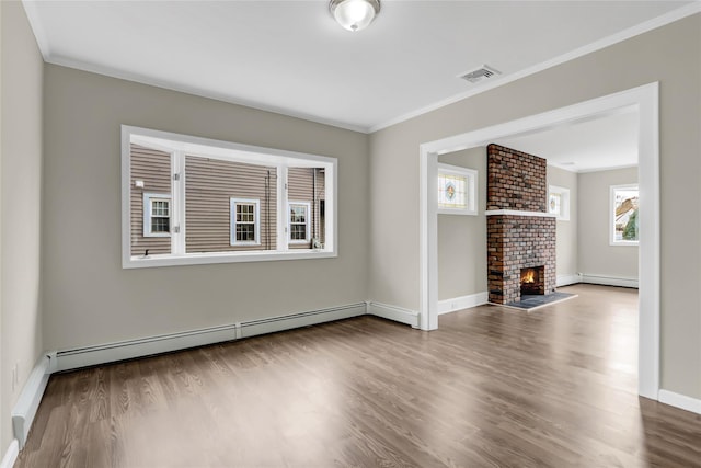 unfurnished living room featuring hardwood / wood-style floors, a fireplace, and baseboard heating