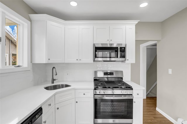 kitchen featuring white cabinets and stainless steel appliances