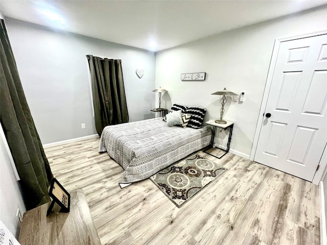 bedroom featuring light hardwood / wood-style floors