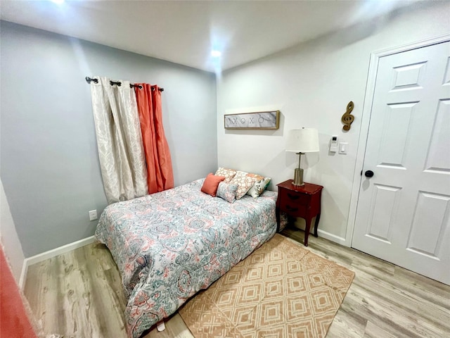 bedroom featuring light wood-type flooring