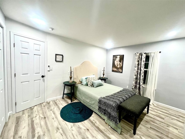 bedroom featuring light hardwood / wood-style floors