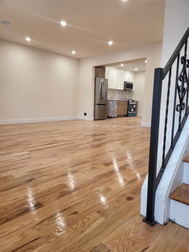 living room featuring light wood-type flooring