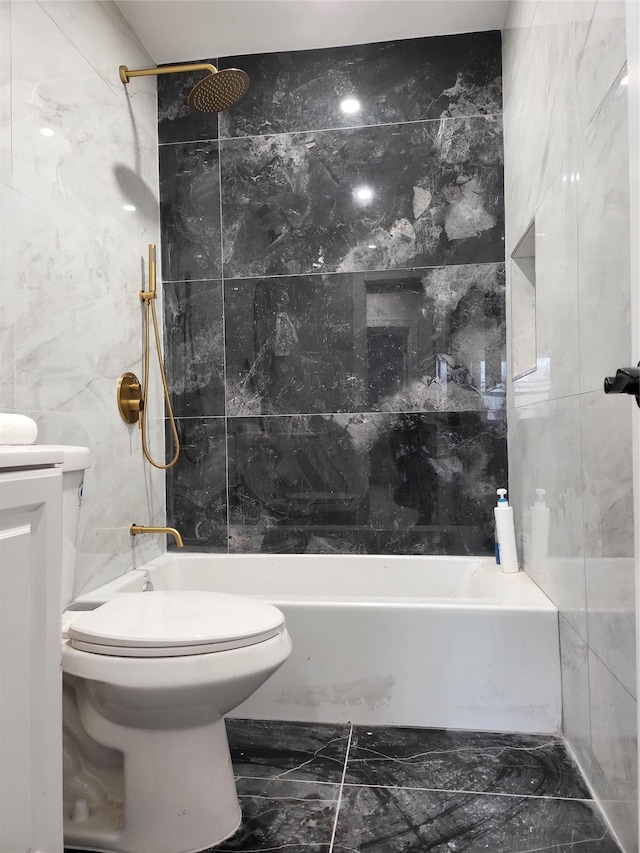 bathroom featuring  shower combination, toilet, and tile walls