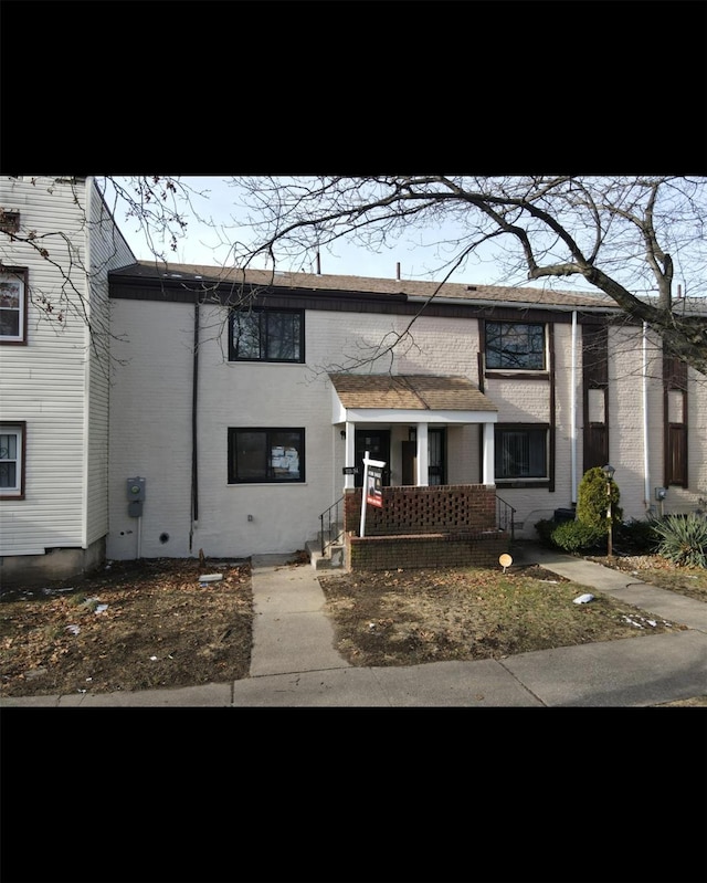 view of property with covered porch