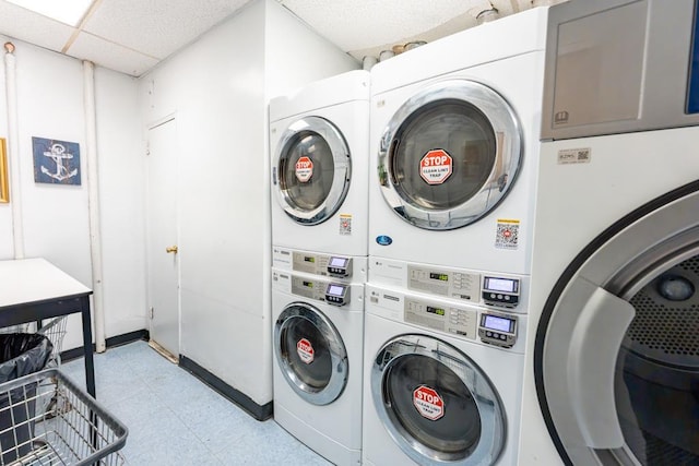 clothes washing area featuring separate washer and dryer and stacked washer and dryer