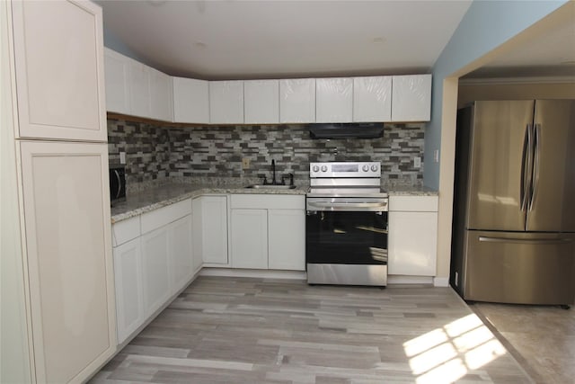 kitchen with appliances with stainless steel finishes, white cabinetry, and sink