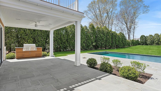 view of swimming pool with a lawn, ceiling fan, a patio area, a grill, and area for grilling