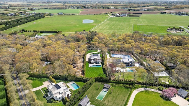 birds eye view of property featuring a rural view