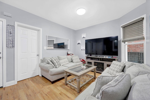 living room with light hardwood / wood-style floors