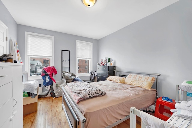 bedroom featuring light wood-type flooring