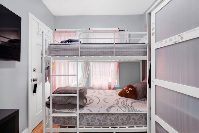 bedroom featuring wood-type flooring