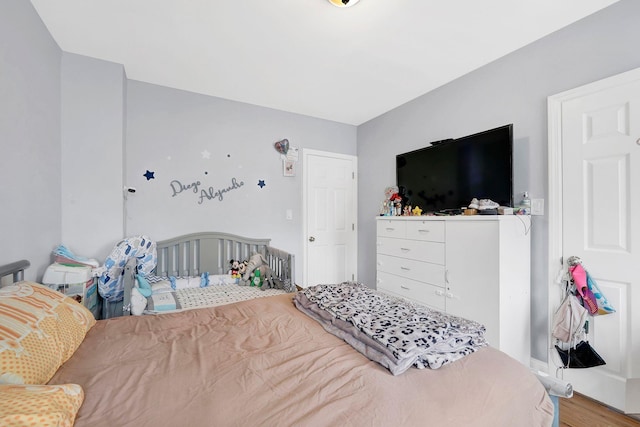 bedroom featuring hardwood / wood-style floors