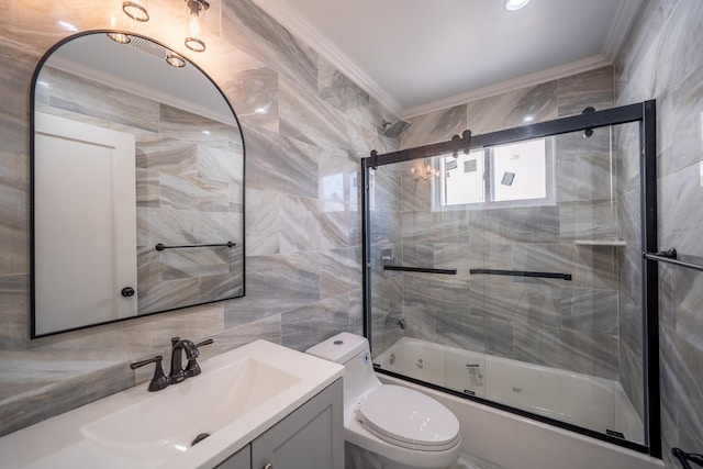 115-42 Inwood St, Jamaica, NY 11436 - full bath featuring ornamental molding, tile walls, toilet, vanity, and combined bath / shower with glass door
