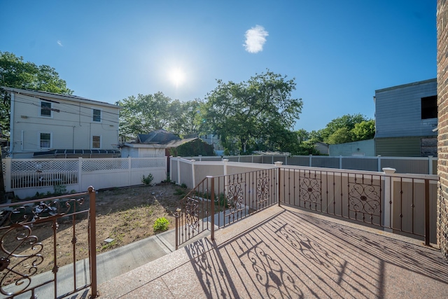 115-42 Inwood St, Jamaica, NY 11436 - fenced backyard featuring a patio area