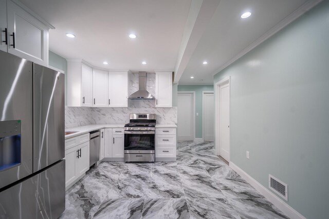 115-42 Inwood St, Jamaica, NY 11436 - kitchen featuring stainless steel appliances, wall chimney range hood, backsplash, recessed lighting, and light countertops
