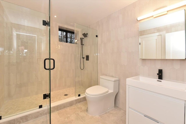 bathroom featuring vanity, toilet, tile walls, walk in shower, and tasteful backsplash