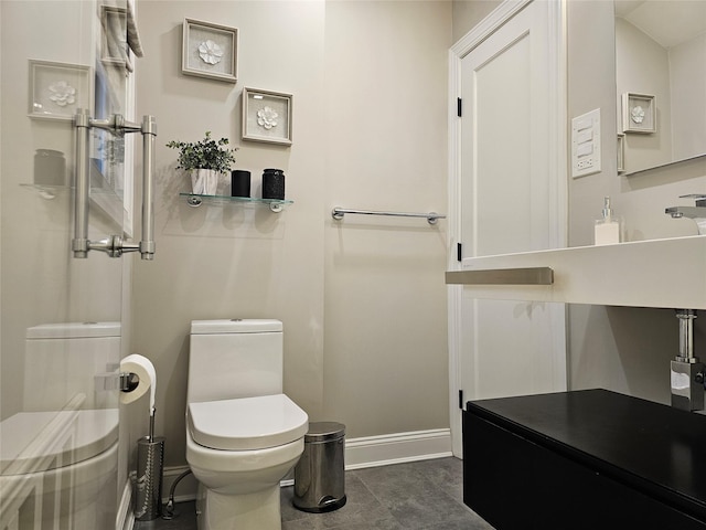 bathroom featuring tile patterned floors and toilet