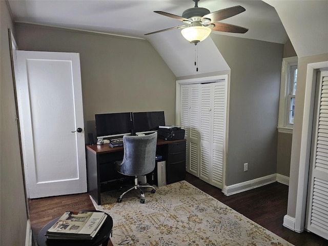 office space with ceiling fan, dark hardwood / wood-style flooring, and vaulted ceiling