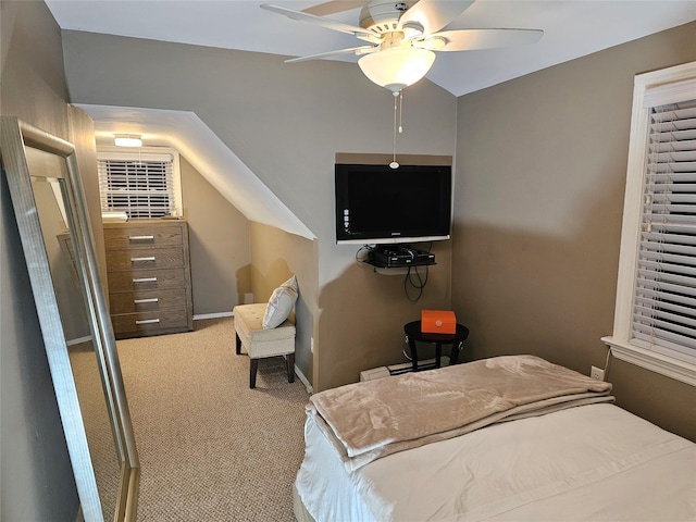 bedroom featuring light colored carpet and ceiling fan