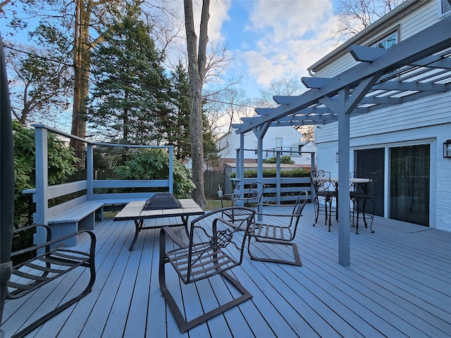 wooden terrace with a pergola