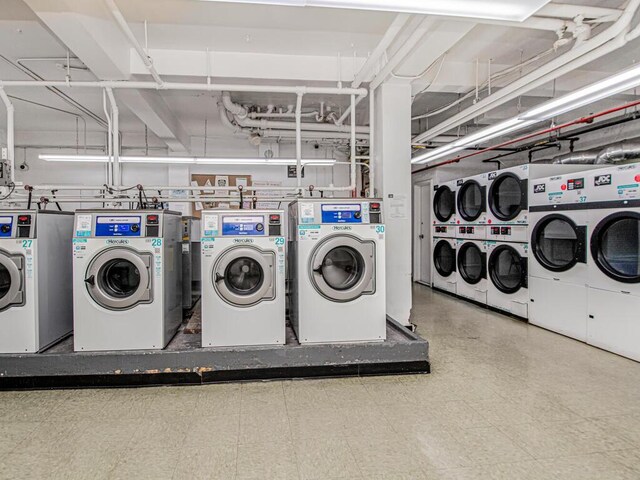 washroom with washer and clothes dryer and stacked washer / dryer