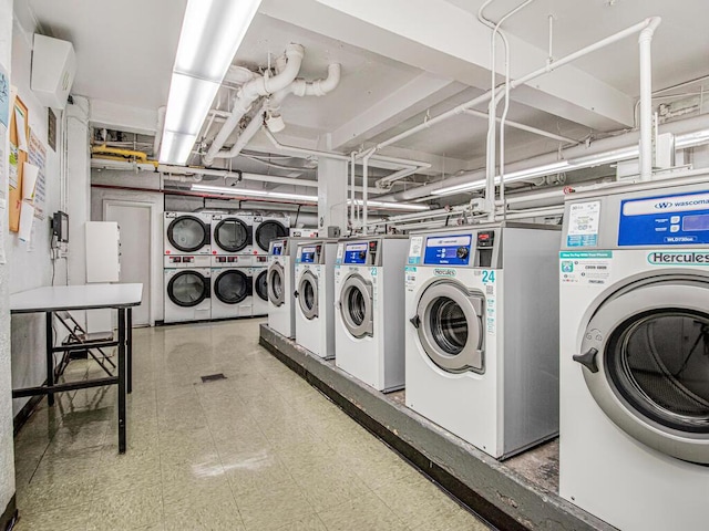 laundry area featuring separate washer and dryer and stacked washing maching and dryer