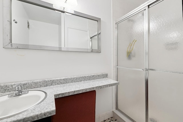 bathroom featuring vanity and walk in shower