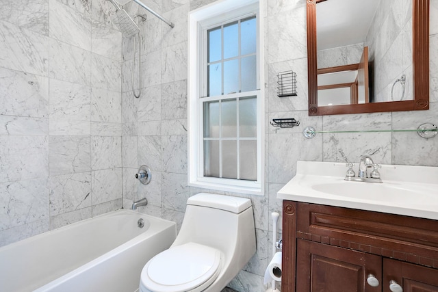 full bathroom featuring shower / bathtub combination, vanity, tile walls, and toilet