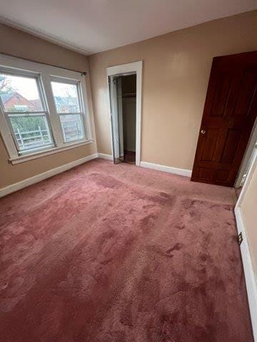 unfurnished bedroom featuring carpet floors